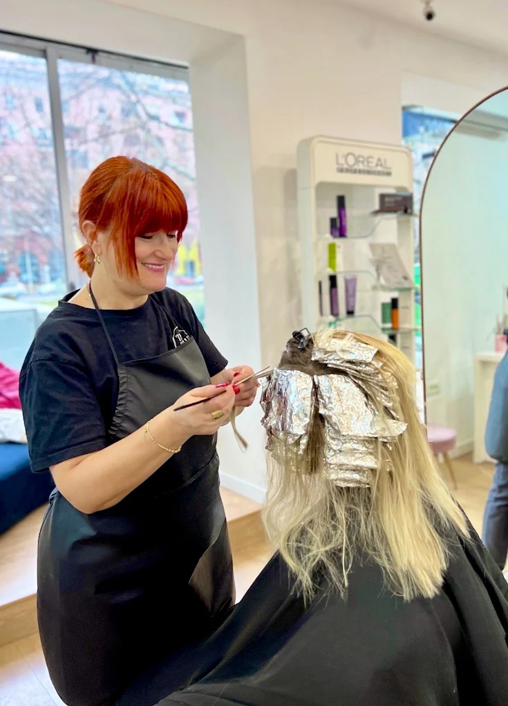 Ela creating a blonde colour at Ela Beauty Salon