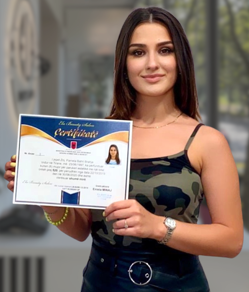Academy graduate holding her completion certificate
